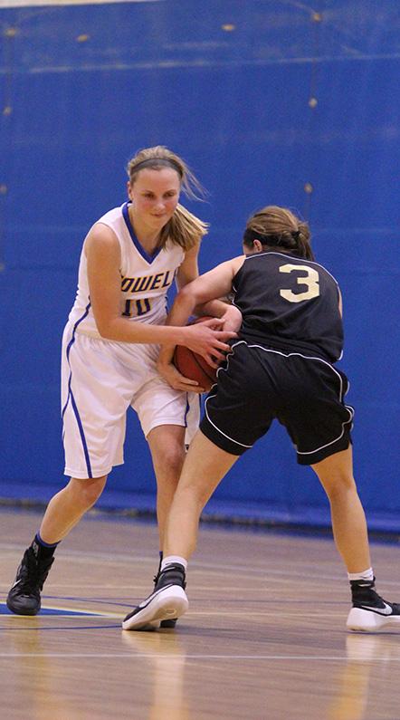During the game against North, JV Lady Vikings won 46 to 22, Jan. 22. Sophomore Jess Fisher tries to maintain keeping the ball.  