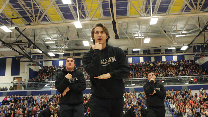 Seniors Ryan Perkins, Aric Heismeyer, and Luke Kahle perform their Golden Guys dance during the Feb. 17 assembly.