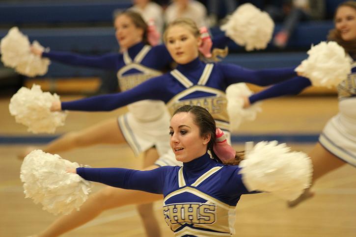 Durring halftime at the JV girls basketball game 2/16, in the main gym at Howell, JV golden girls performe their dance routine. I really love dancing durring basketball halftimes, because we can show the fans of Howell Sports what we are about as a team, in that way., junior Delaney Squires said.