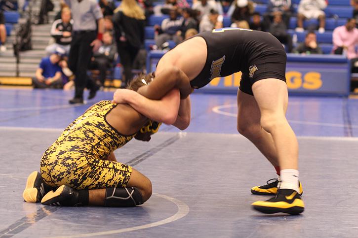 Senior Samuel Heese wrestles with the opponent from Hazelwood Central
during the wrestling varsity GAC Championship.