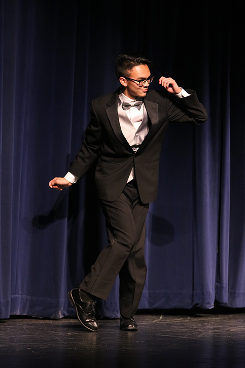 Junior Kane Katubig dances to Number 9 during the Mr. Viking show, Feb. 27. 