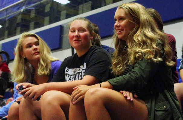 Tuesday Aug. 17, junior Amber Stoutenborough, freshman Alyssa Miller and junior Gwyneth Worobec attend the Viking Leadership Academy kick off in the big gym. Viking Leadership Academy encouraged the students to come together while participating in team building exercises.
