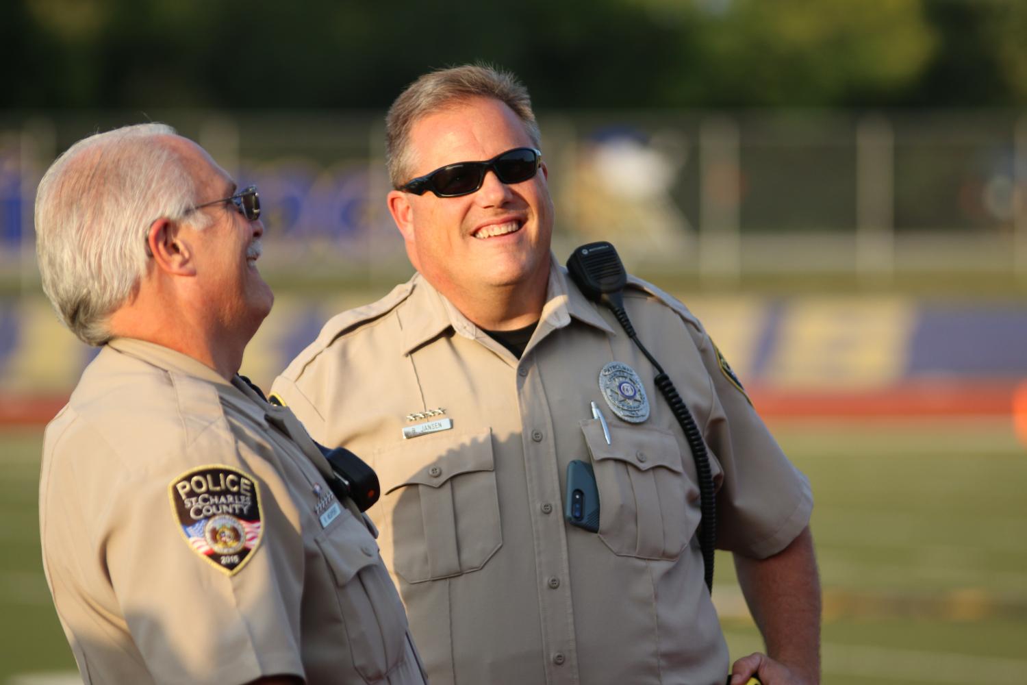 Deputy Ron Neupert and Deputy Bret Jansen accept their recognition at the annual First Responders football game Friday, Sept. 8.  The entire fan section gave the officers a standing ovation while wearing Red, White, and Blue and creating our country’s flag. 