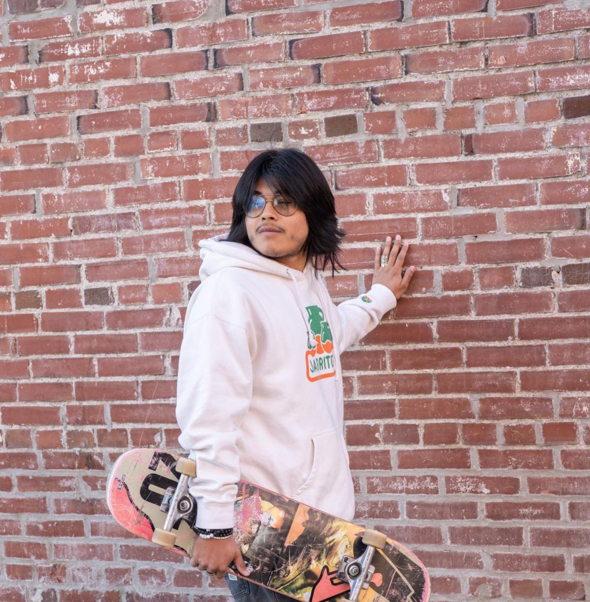 Come On, Vogue: Senior Alex Figgins poses for a picture behind Soulard Art Gallery. He was with his mom and skating around the area. “My mom went there with me and I skated around for a little bit. A car almost hit me, but they missed, so we’re good," Figgins said.
